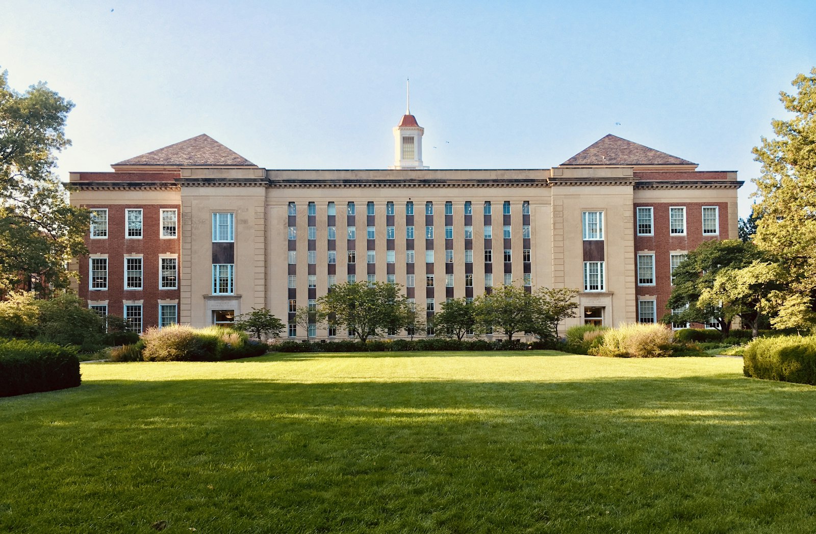 Students walking across a university campus